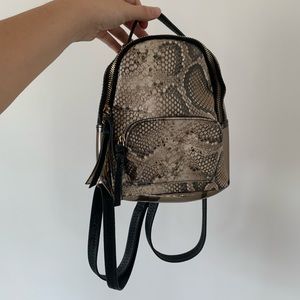 Free People snakeskin mini backpack
